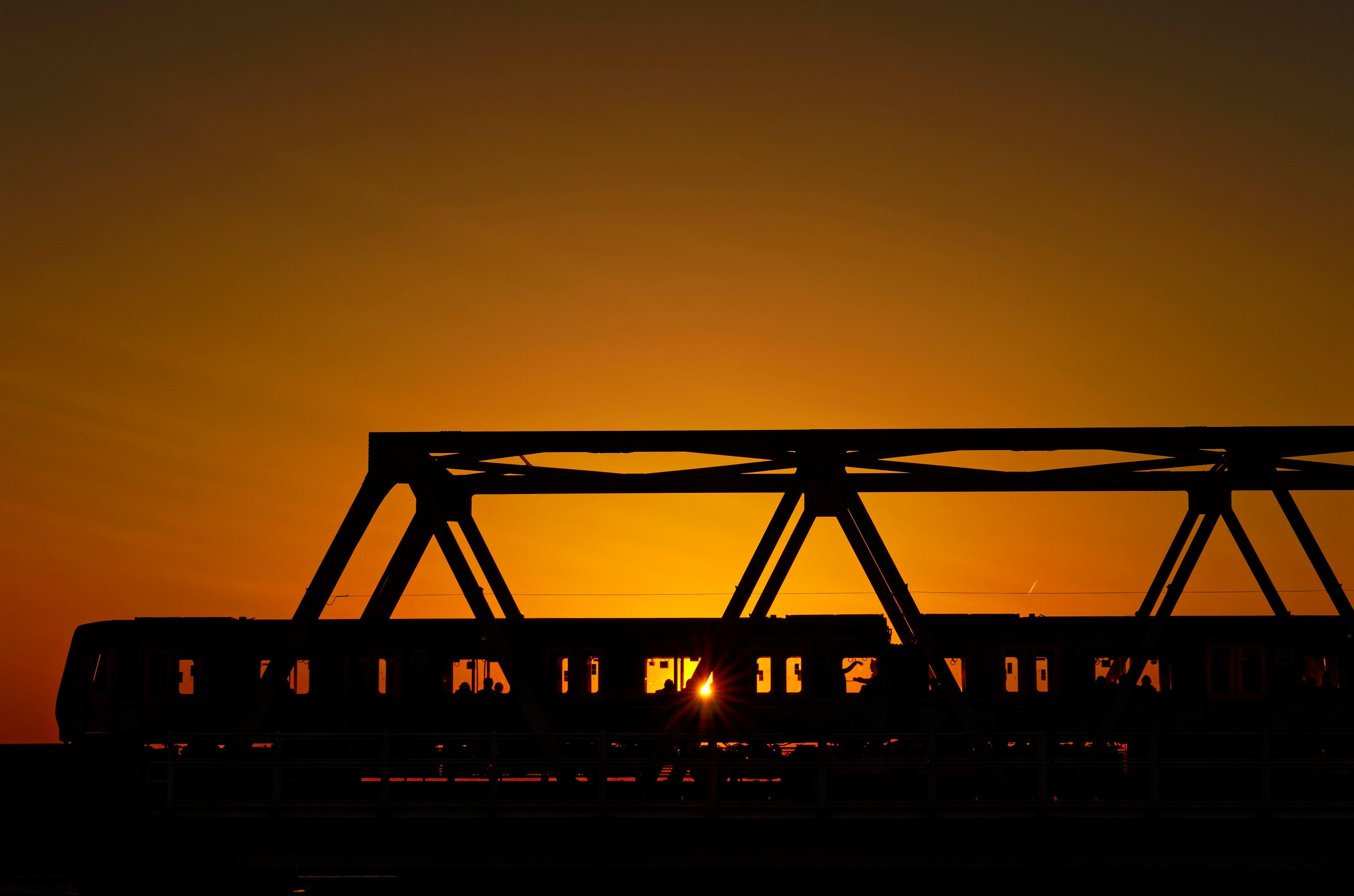 silhouette of bridge during sunset